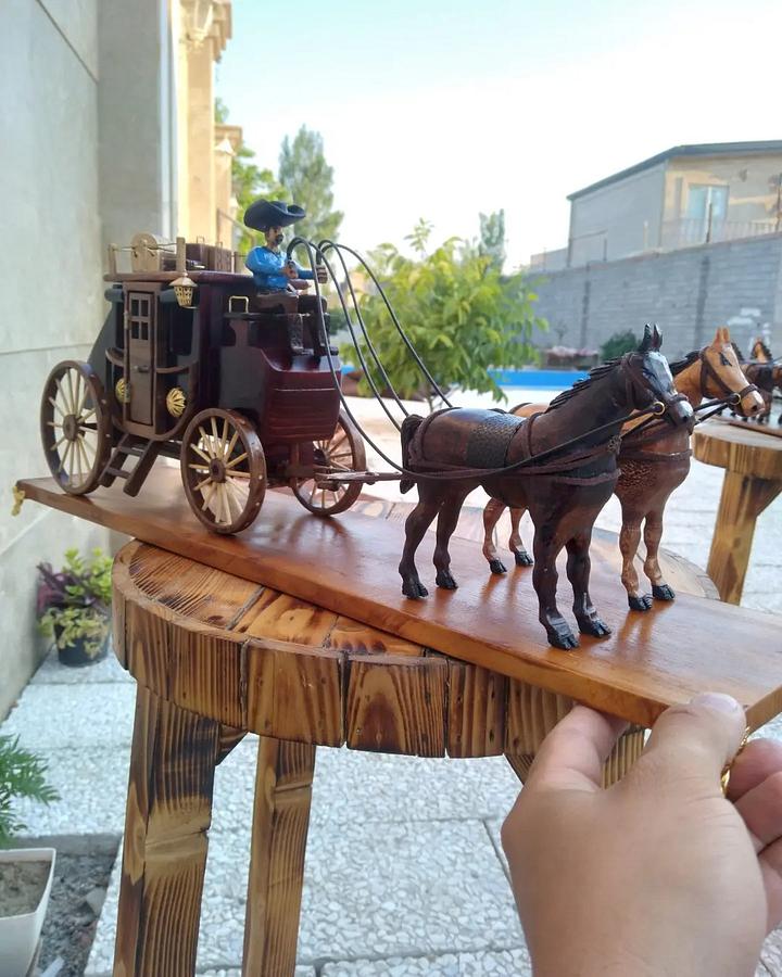 Carriage with a wooden horse