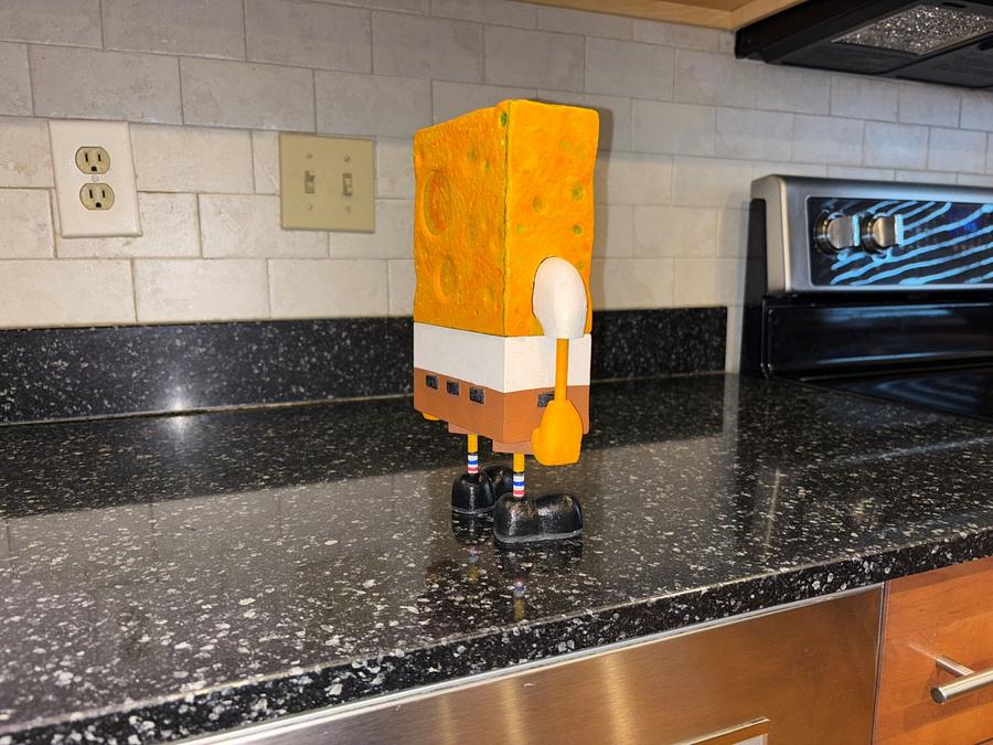 Who lives in a pineapple under the sea?