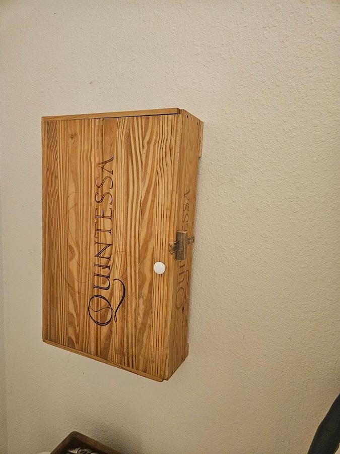Wine box turned into something else.