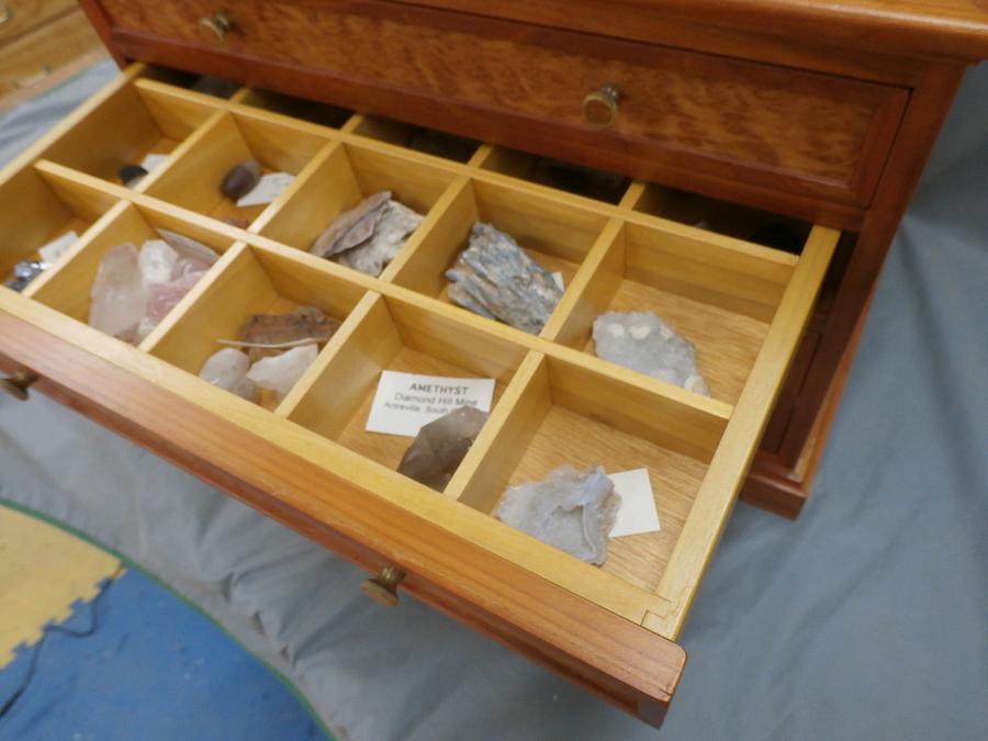 Rock and sea shell display cabinet