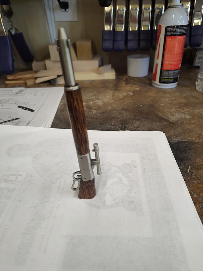 First lever action pen