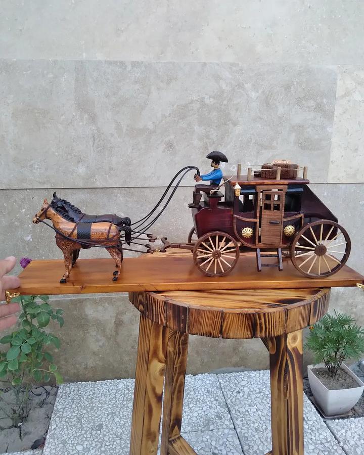 Carriage with a wooden horse