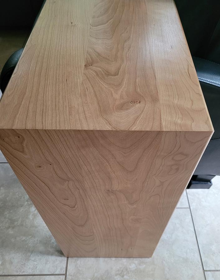 Side table with waterfall cherry feature 