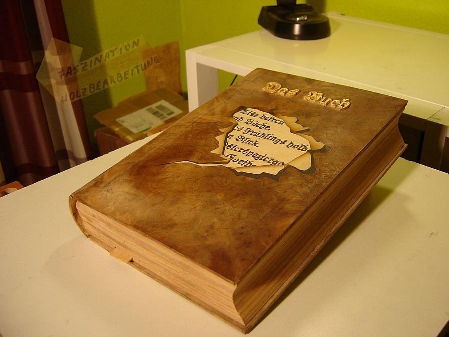 The book, of wood.