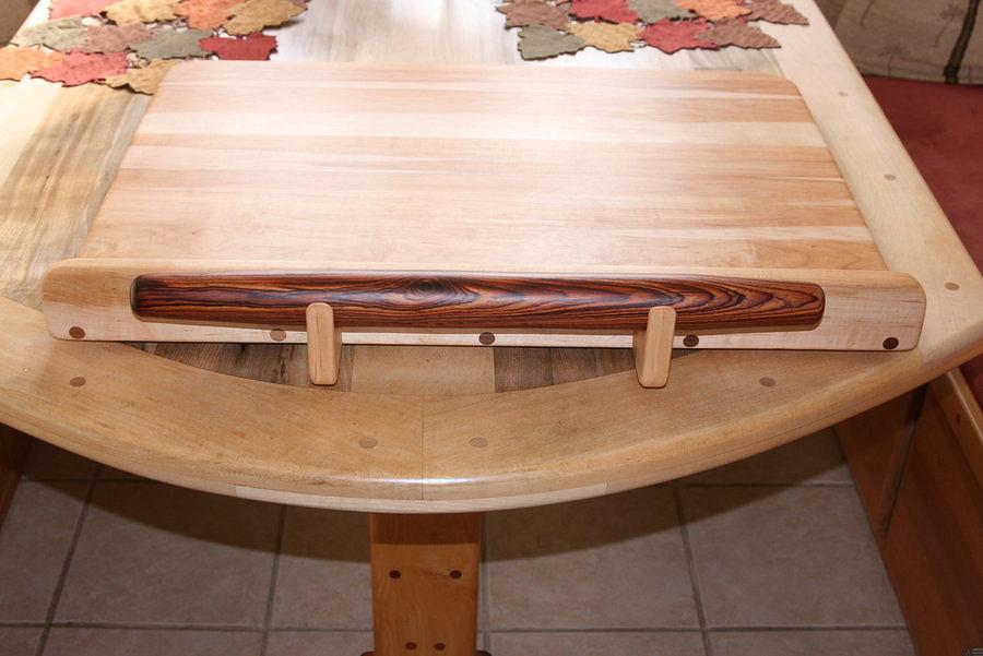 dough rolling board and french rolling pin.