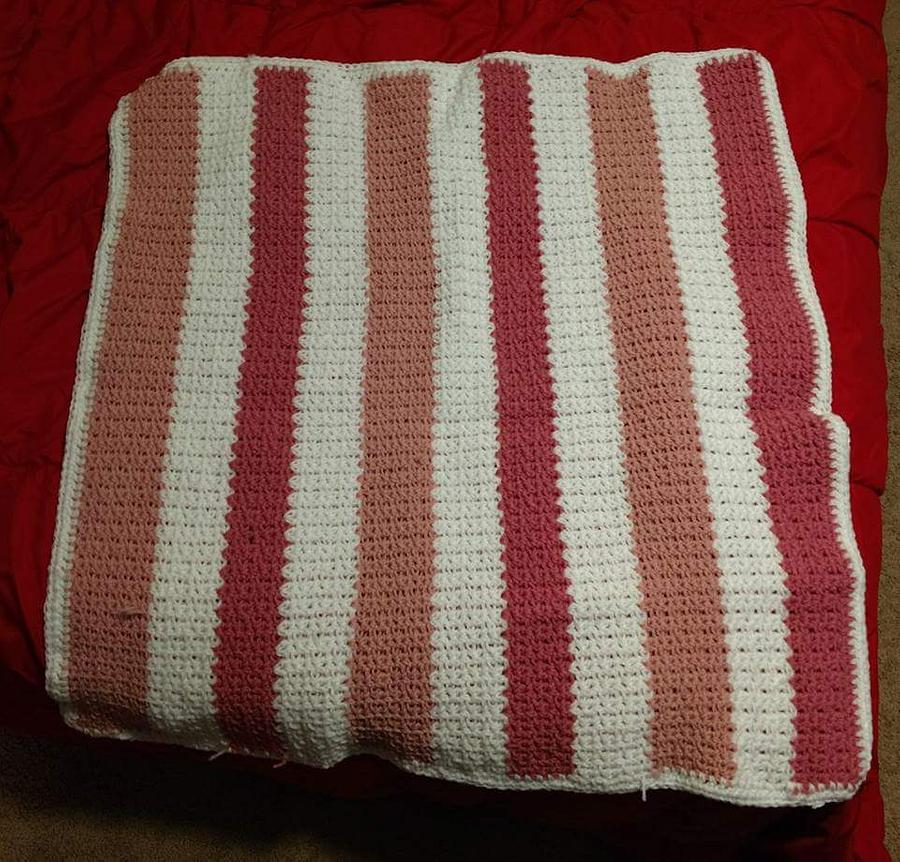 Pink and white striped baby blanket