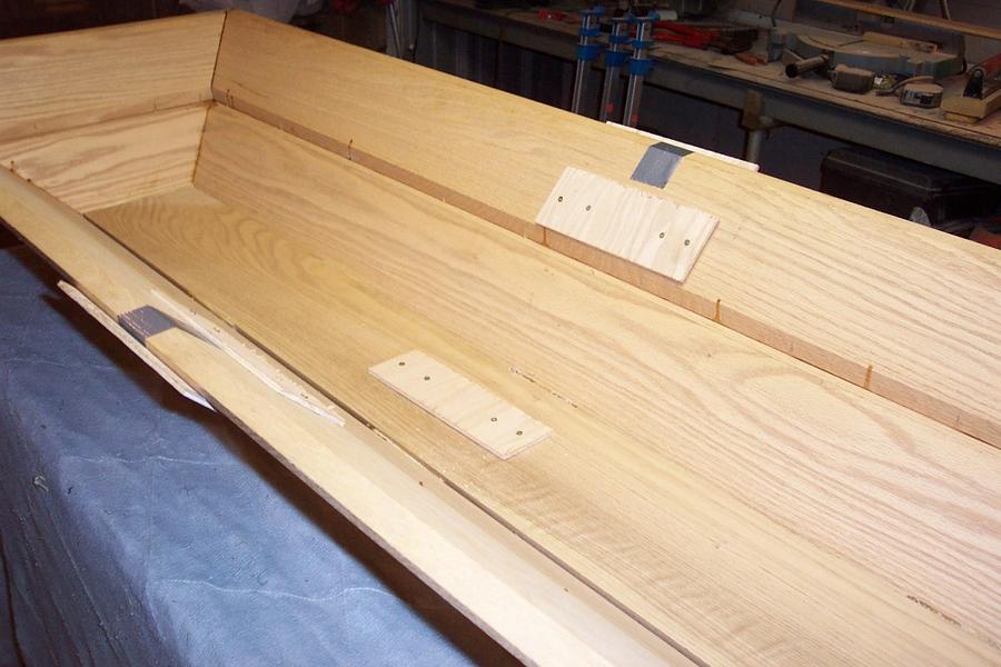 casket , cutting the lid