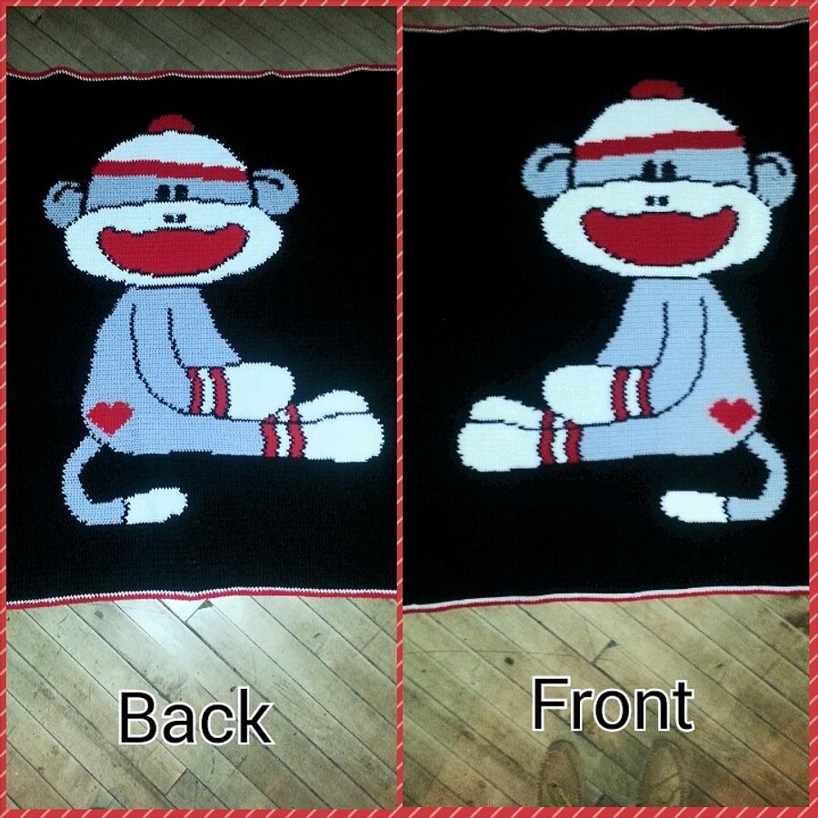 crocheted reversable Sock Monkey Blanket