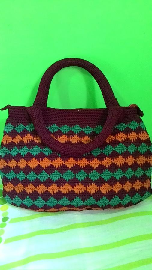 Spike stitch handbag