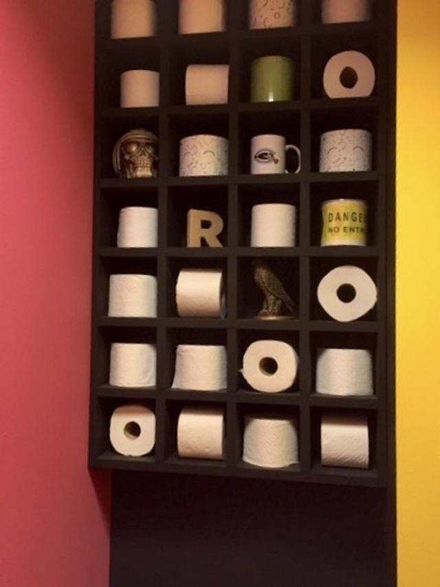 A shelf with a new roll