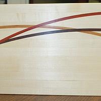 Inlaid cutting board sized for a rack of ribs - Project by Steve Rasmussen