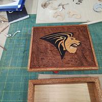 Grandkids in college mascots 