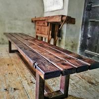 Industrial bench with rusty legs