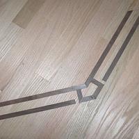 Hardwood floor inlays - Walnut in Oak