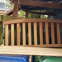 Restored a teak garden bench with reclaimed teak.