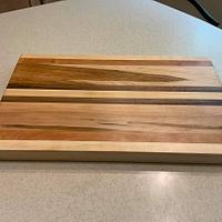 Maple and Walnut cutting board.  - Project by Galvipa