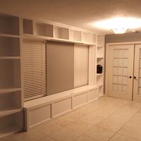 Full Wall Shelving with Storage Bench and Bridge of Cabients