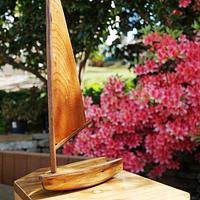 It's a toy sailing boat on top of a big lump of wood.... - Project by crowie