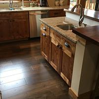 Knotty Alder kitchen Cabinets and Black Walnut live edge counter top