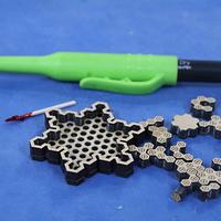 Hexy Jigsaw Snowflake (Any one for Naughts and Crosses?).