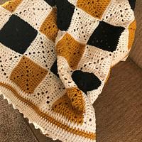 Crocheted solid granny square lap throw - Project by Shirley