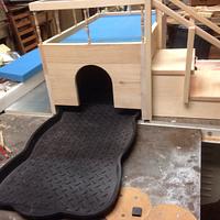 Dog bed with potty chamber