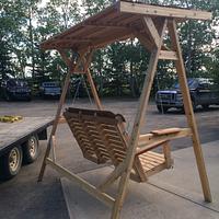 Cedar lawn swing with wood canopy