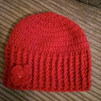 red beanie with flower - Project by maggie craig