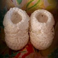 Baby booties with lace detail - Project by Emma Stone