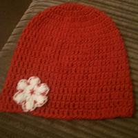 red slouch beanie with flower - Project by maggie craig