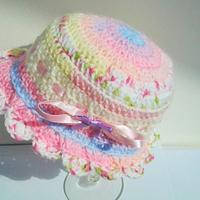 Crocheted frilled beanie hats