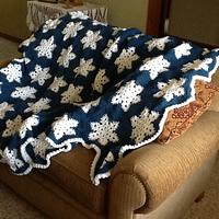 Crocheted Snowflake throw - Project by Shirley
