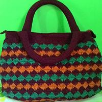 Spike stitch handbag