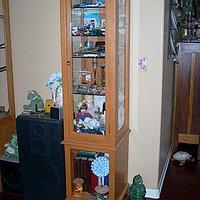 Mantle, Entertainment Center and Glass Case