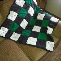 Crocheted Solid Granny Square lap throw - Project by Shirley