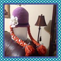 Purple hat with red braided pigtails - Project by Alana Judah