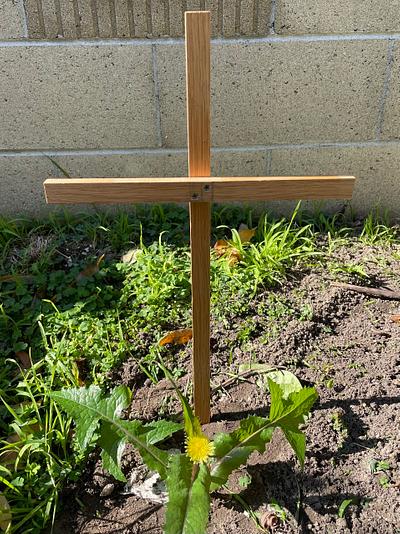 Dr. Quacker builds a cross for a fallen friend.  - Project by DrQuackner