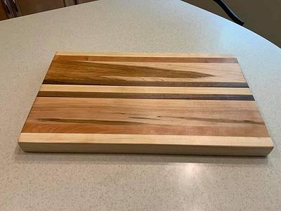 Maple and Walnut cutting board.  - Project by Galvipa