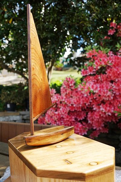 It's a toy sailing boat on top of a big lump of wood.... - Project by crowie