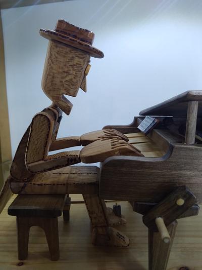 Animated piano player - Project by siavash_abdoli_wood