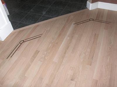Hardwood floor inlays - Walnut in Oak - Project by Steve Rasmussen