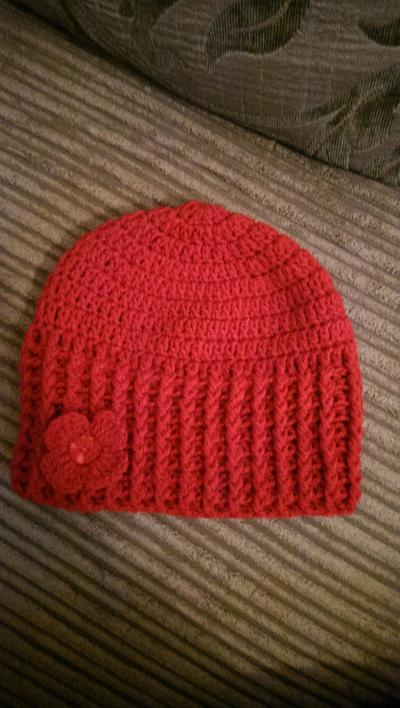 red beanie with flower - Project by maggie craig