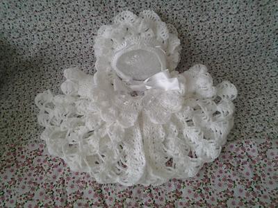 Beautiful frilled coat and petal design hat  - Project by Catherine 