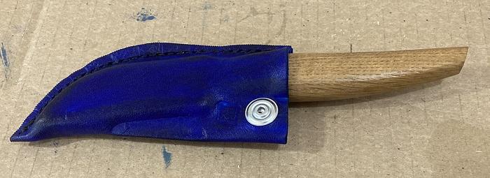 Sheath for curved carving knife