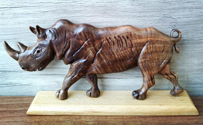 Rhinoceros sculpture with walnut wood