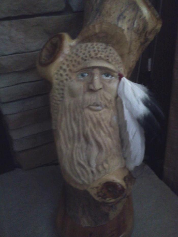 Mountain man from a cedar log