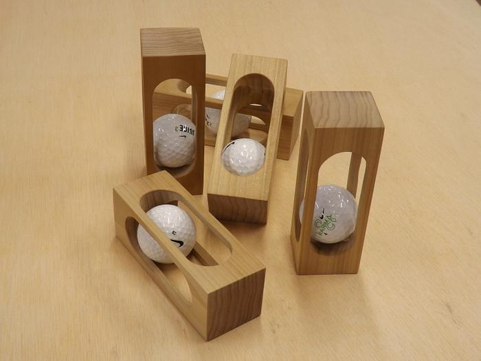 Golf Ball in Wood Block
