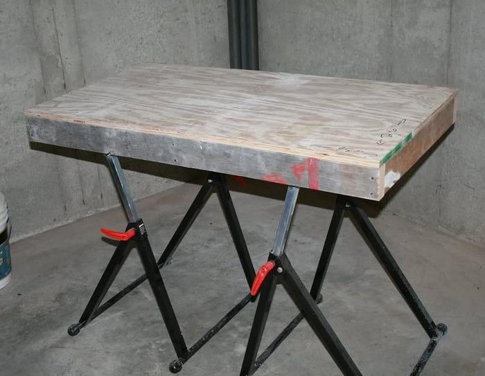 Height adjusts, but barely passes as a woodworking project.