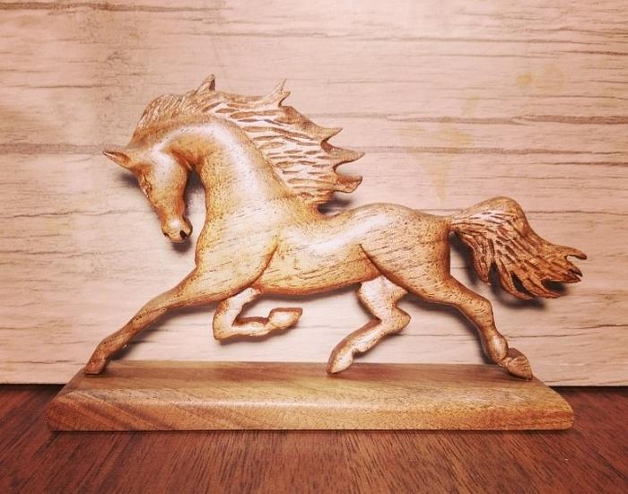 Horse sculpture made of walnut wood