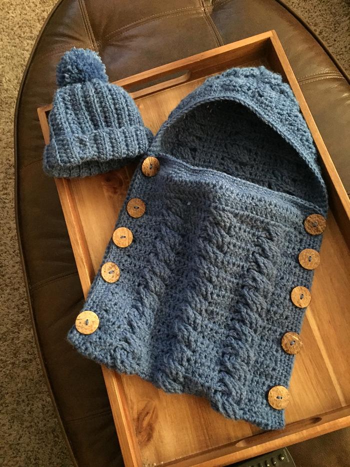 Crocheted baby bunting with matching hat